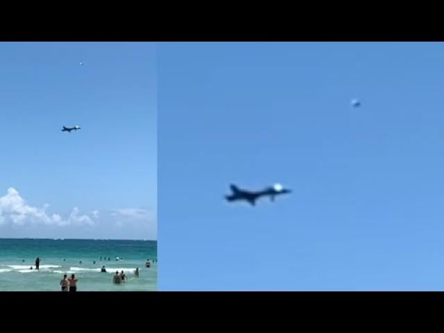 What Is That Object Shooting Off? Incredibly Fast UFO Filmed Close To Fighter Jet over Miami Beach