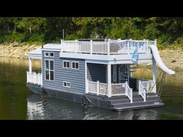 This Houseboat Looks Normal At First Glance Is Hiding One Of The Coolest Secrets Around