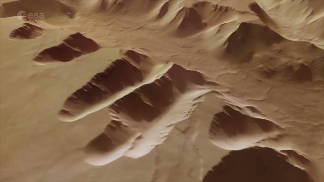 Fly over Mars' 'Noctis Labyrinthus' in this visualization from spacecraft data