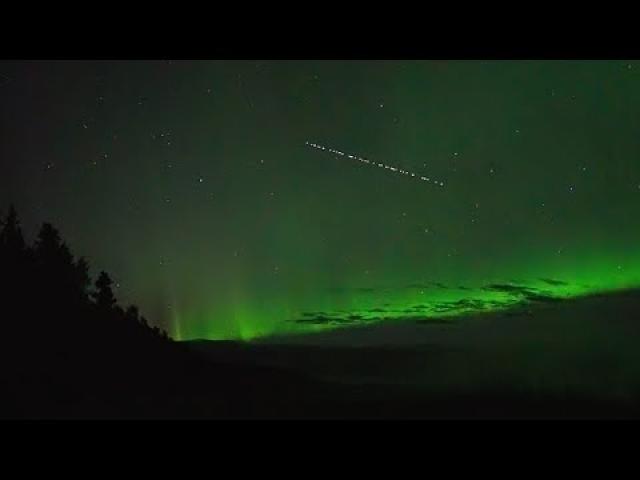 SpaceX Starlink 'train' passes over Northern Lights in 'Aurora Chasers' video