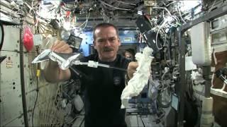 Wet Washcloth In Space - What Happens When You Wring It? | Video