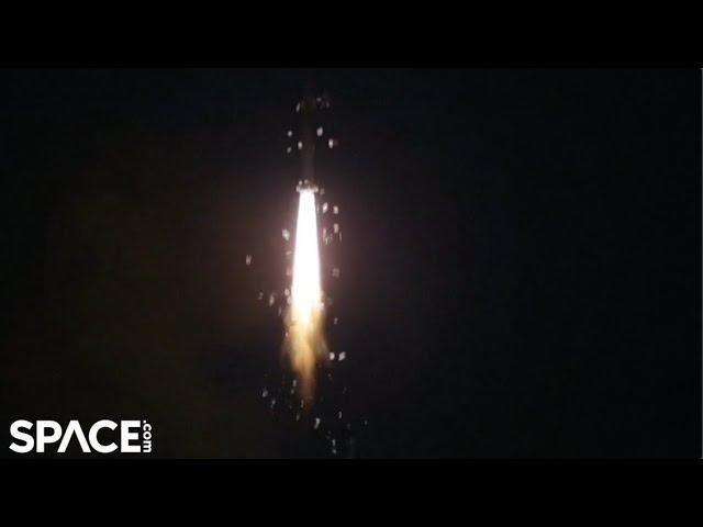 Chinese rocket's insulation tiles rain down in nighttime launch