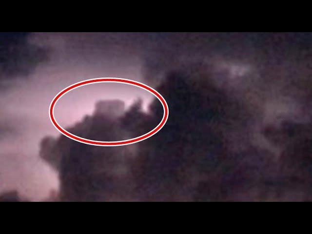 During a lightning storm over Vineland, New York a cube shaped anomaly appears in the clouds