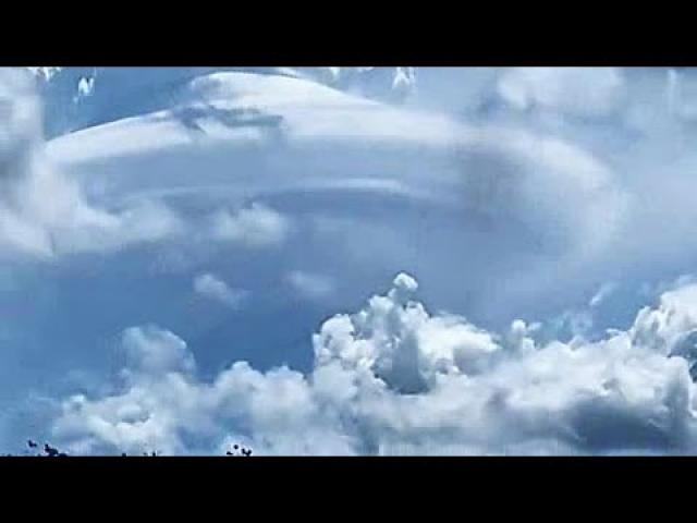 Huge Disc-Shaped UFO Mothership caught on film over Miami