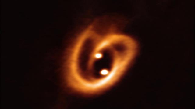 Twin Baby Stars' Disks Unite to Form a 'Cosmic Pretzel'