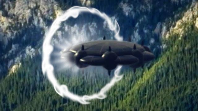 Airplane passenger caught on video two UFOs leaving a portal over Atlanta, USA