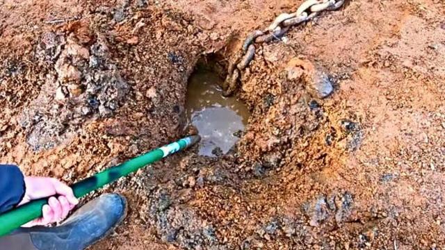 Dad Finds Buried Chain After Landscaping Yard, He Instantly Regrets It