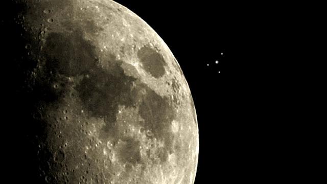 Incredible Footage Of A Strange Object Or UFO Near The Moon?