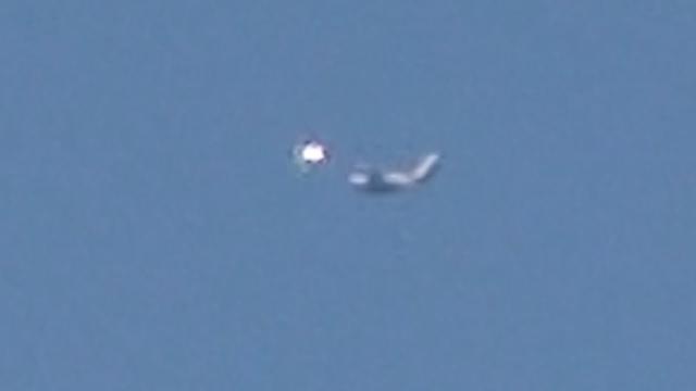 Mysterious UFO Sighting with Bright Light Near Airliner in Orange County, California - FindingUFO