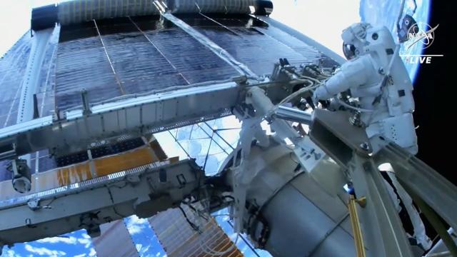 Rollout Solar Array deployed during spacewalk outside space station