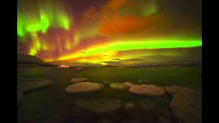 Red and Green 'Christmas' Auroras Light Up Skies Over Sweden | Video