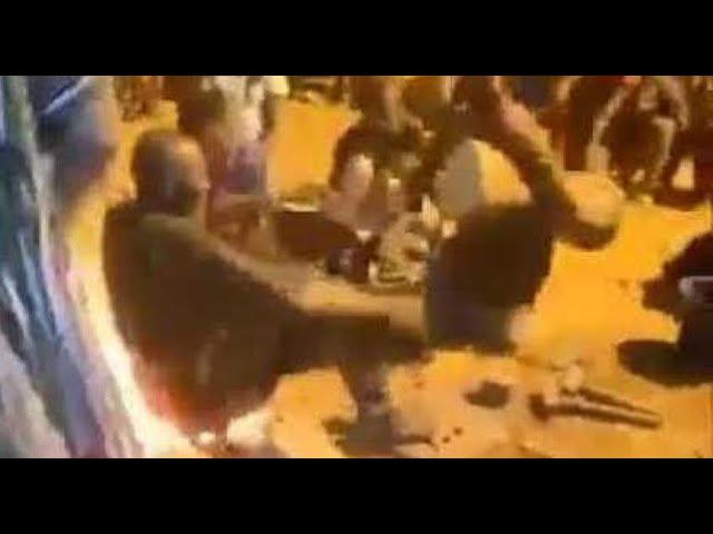 Is this real? African shaman dances in fire without the slightest burn!