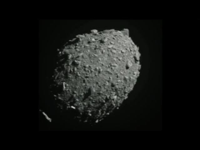 Bam! NASA's DART spacecraft slams into 'moonlet' in asteroid system