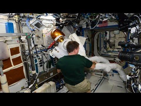 Astronaut Terry Virts Setting Up Robonaut