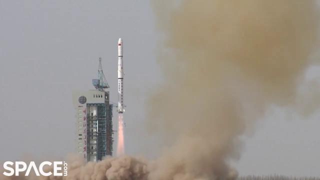 China launches new reconnaissance satellites, see rocket shed tiles in slo-mo