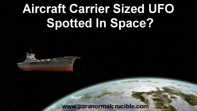 Aircraft Carrier Sized UFO  Caught In Earths Orbit?