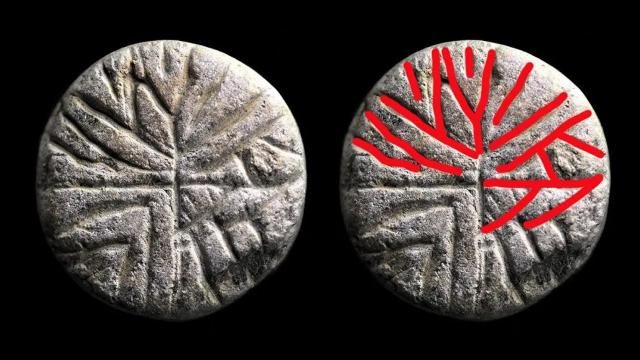 ARCHAEOLOGISTS FIND GAMING PIECE WITH RUNIC INSCRIPTIONS