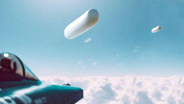 Two Tic Tac shaped UFOs fly parallel to each other at an Airshow in Poland, Aug 2023 ????