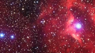 Nebula Glows 'Red' From Hot Young Stars Heat | Video