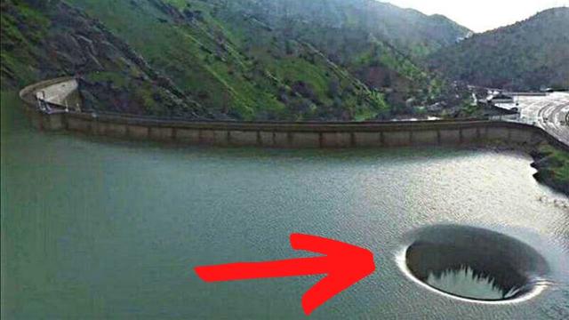 After Noticing A Strange Hole In A Lake, He Sends A Drone To Take A Closer Look !!