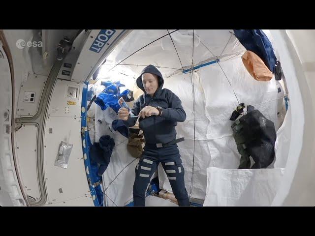 Watch an astronaut prepare for bed in space