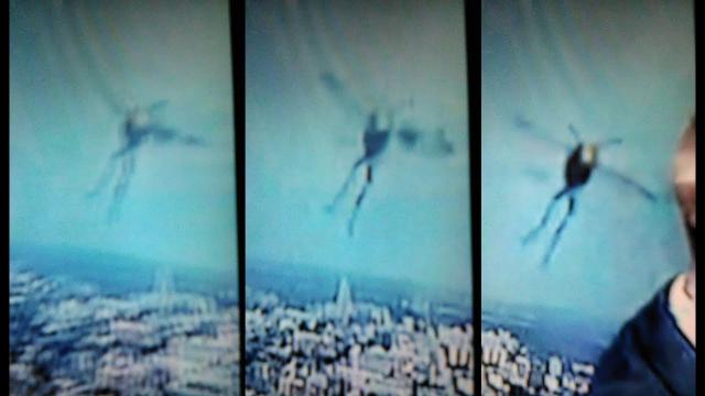 While watching the weather report on television the witness filmed this strange winged creature