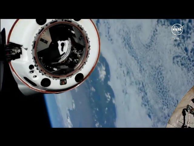 SpaceX Cargo Dragon undocks from space station for return trip