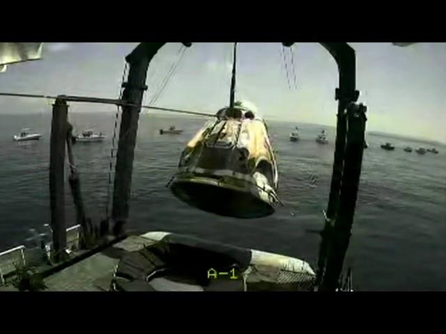 SpaceX Demo-2's Crew Dragon lifted onto recovery vessel