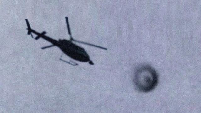 MASSIVE UFO FILMED BY A POLICE HELICOPTER OVER BRISTOL ENGLAND?