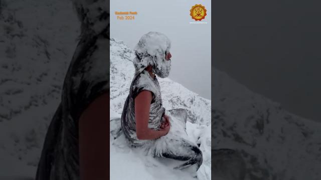 Video shows yogi in deep meditation during heavy snowstorm