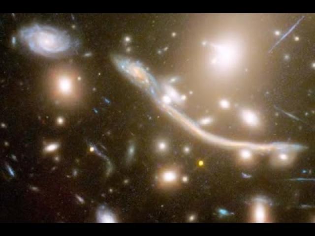 Faint Features from Far Away Galaxy Cluster Resolved by Hubble | Video