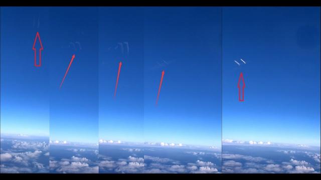 Airplane passenger while flying over Guangzhou, filmed two objects entering the atmosphere