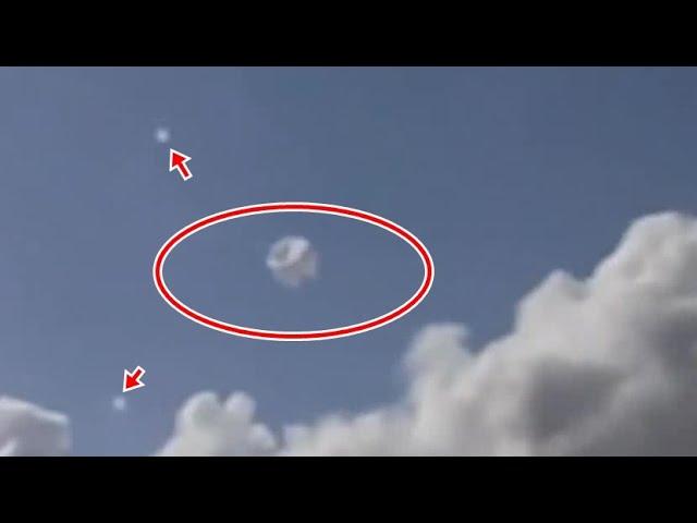Huge Mothership and two orbs that went directly towards it in New York