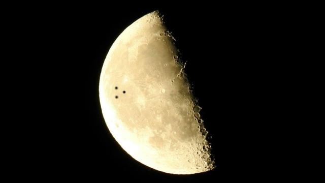 WAS A LARGE DISC-SHAPED UFO SEEN FLYING IN FRONT OF THE MOON?