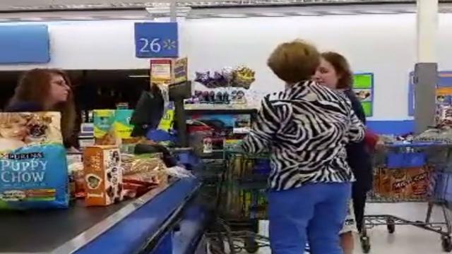 Woman Pushes Into Walmart Line, Conversation Has Mom In tears !