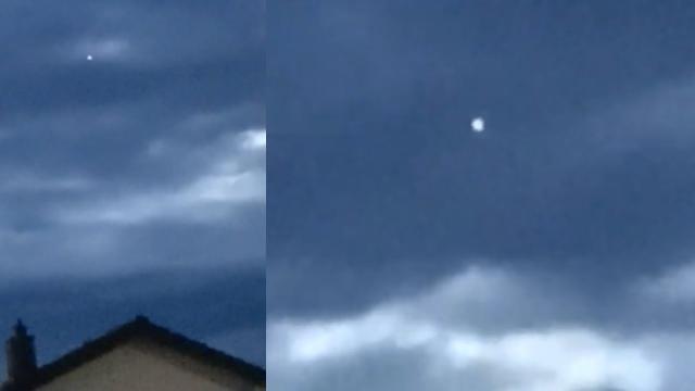 Mysterious Glowing UFO Orb Hovering and Moving Through Clouds over Austria - FindingUFO
