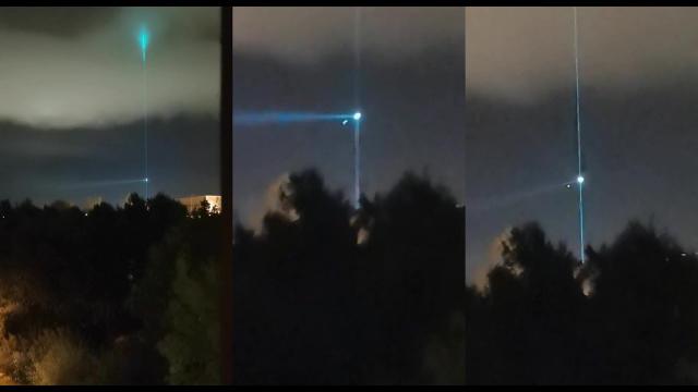 Watch as UFO shoots a green laser into the sky