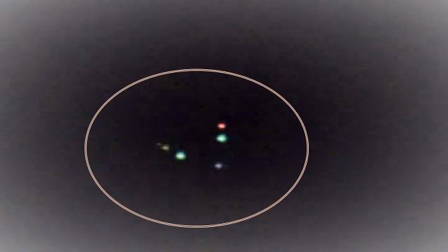 Triangular UFO with Pulsing Colored Lights Filmed over Caguas, Puerto Rico
