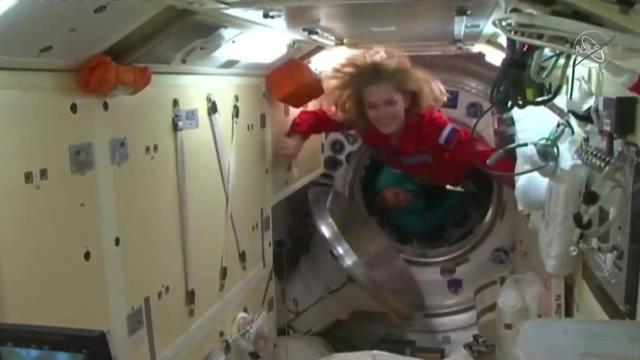 Hatch open! Russian actress &  producer enter space station to film movie