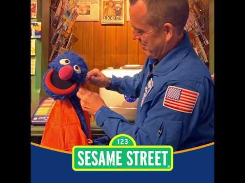 NASA Astronaut Returns Sesame Street Mementos Flown On Orion Spacecraft (Grover's Cape)