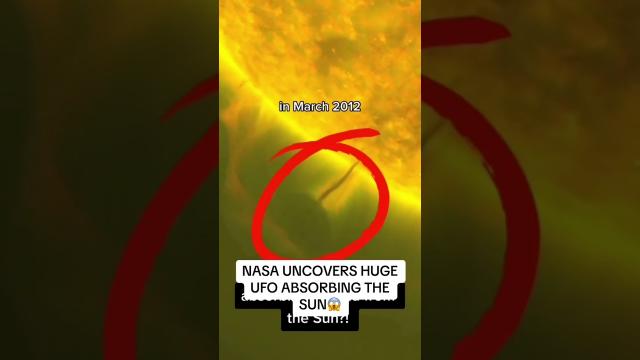 NASA UNCOVERS HUGE UFO ABSORBING THE SUN 2012 ???? #shorts