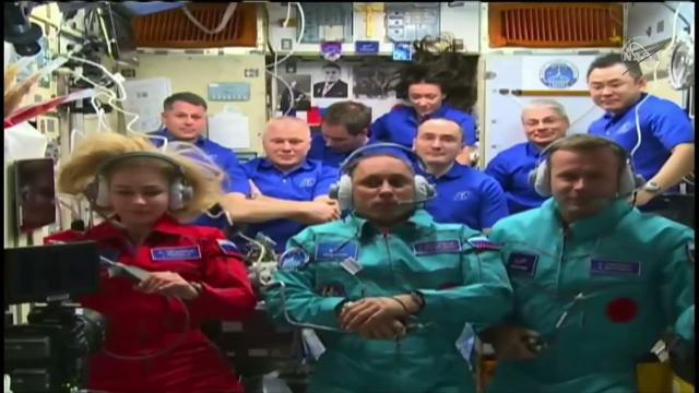 First woman to fly in space calls Russian film crew on space station during ceremony