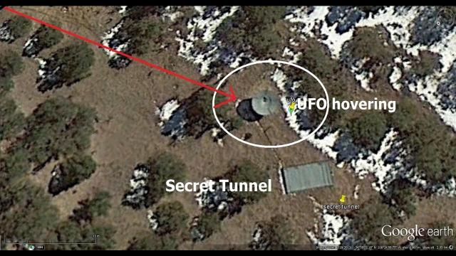 UFO hovering next to a secret tunnel caught on google earth