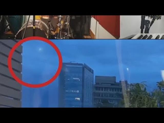 'UFO' appears behind band during music video before darting away