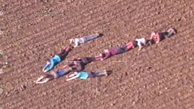 Kids Lie In Field in Strange Way And Refuse To Move, One Look Sends Cops Running !