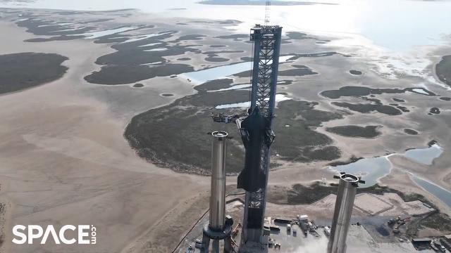 Watch SpaceX stack Starship 24 onto Super Heavy booster in amazing drone video
