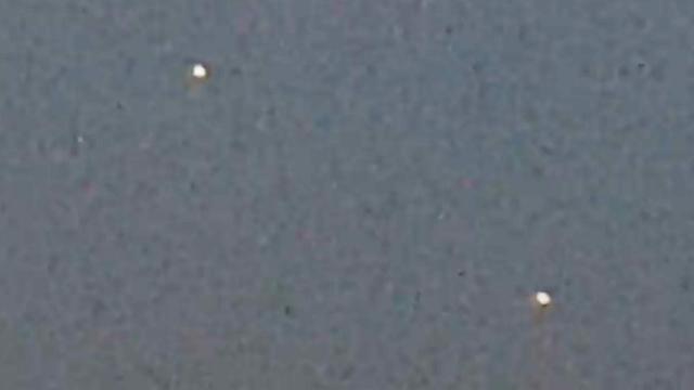 Multiple Bright UFOs in Formation and Fast Appearing Craft over Galveston Bay, Texas - FindingUFO