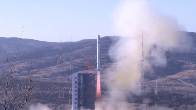 China launches Earth observation satellite, rocket sheds tiles