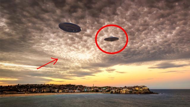 UFO Breaks Through Clouds Landing Somewhere Behind Sydney!!