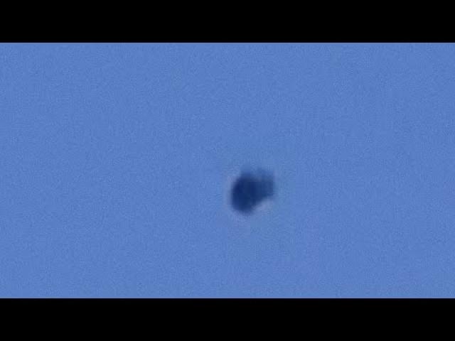 Black UFO Oscillating just over Baseball game during 10 minutes, June 2022 ????